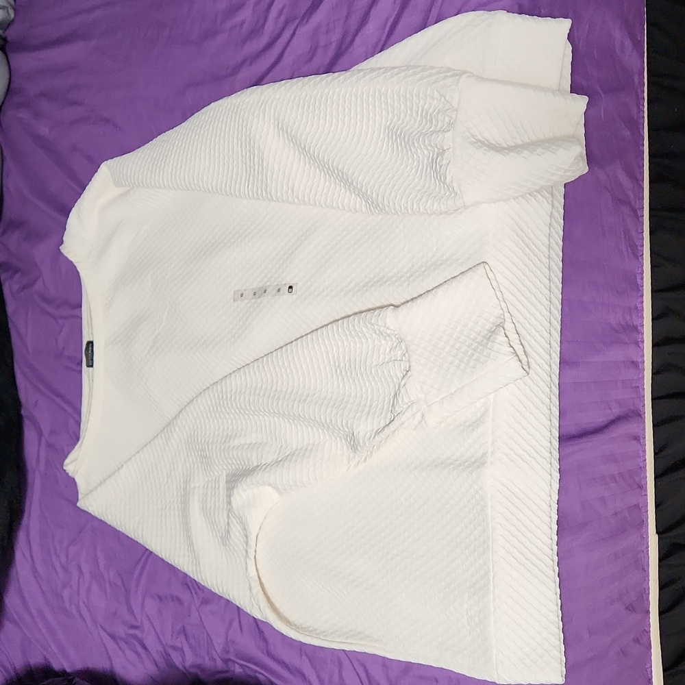 Buckle Black sweater. Cream. Brand new. XL.